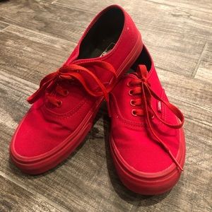 Red Vans shoes.